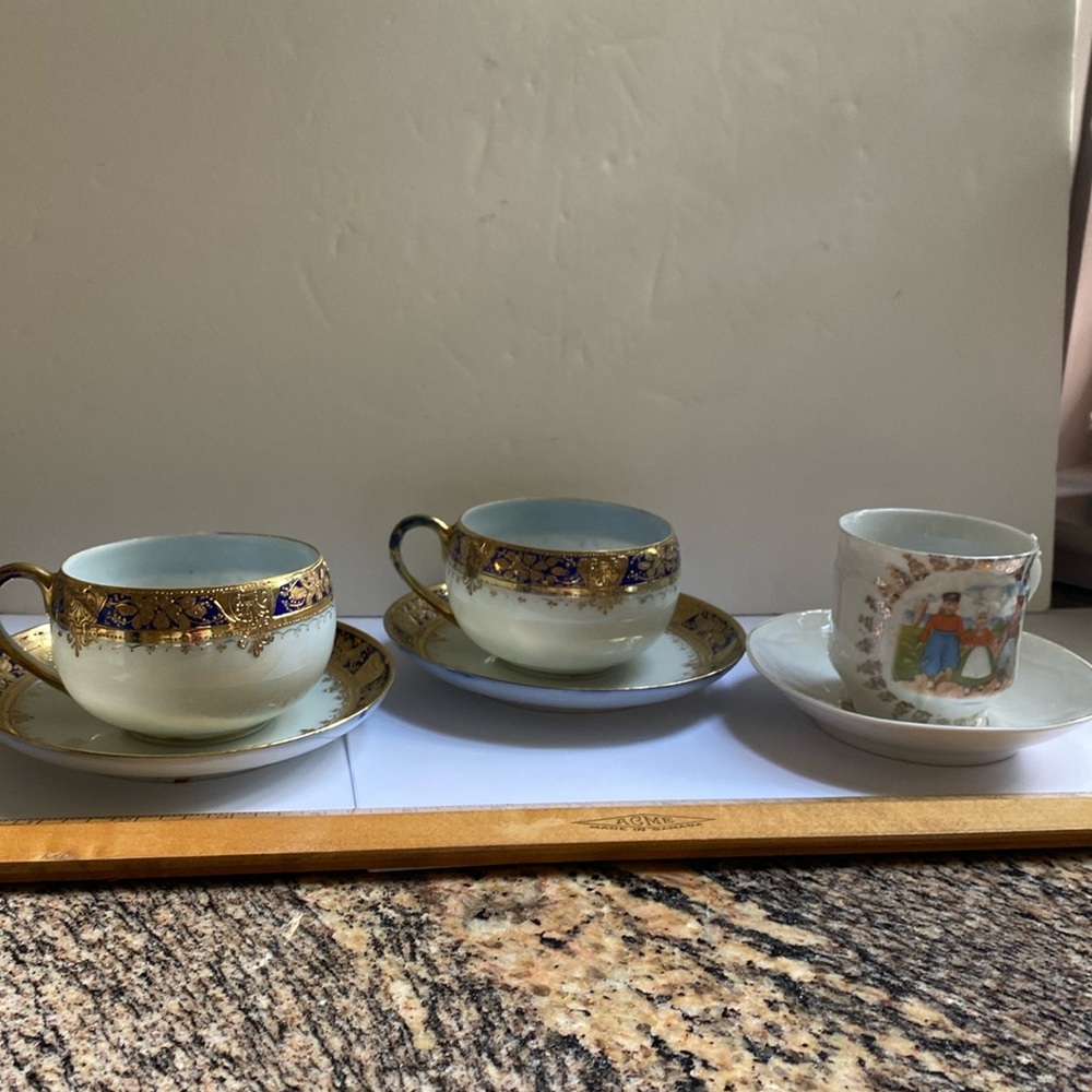 Lot of 2 Asian fine porcelain hand painted cup and saucers and child’s set